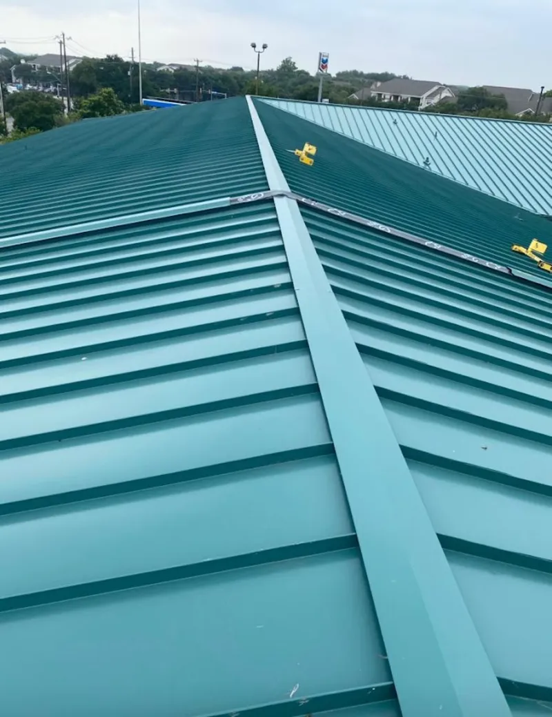 Green commercial metal roof ridge and valley for Metal Roof Repair in Ann Arbor