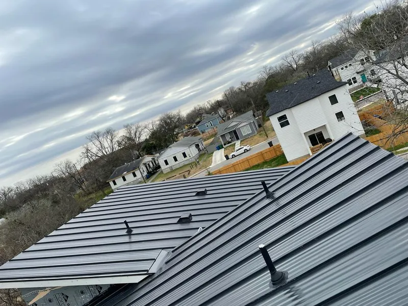 Standing seam metal roof panels with vents for Skylight Repair in Ann Arbor